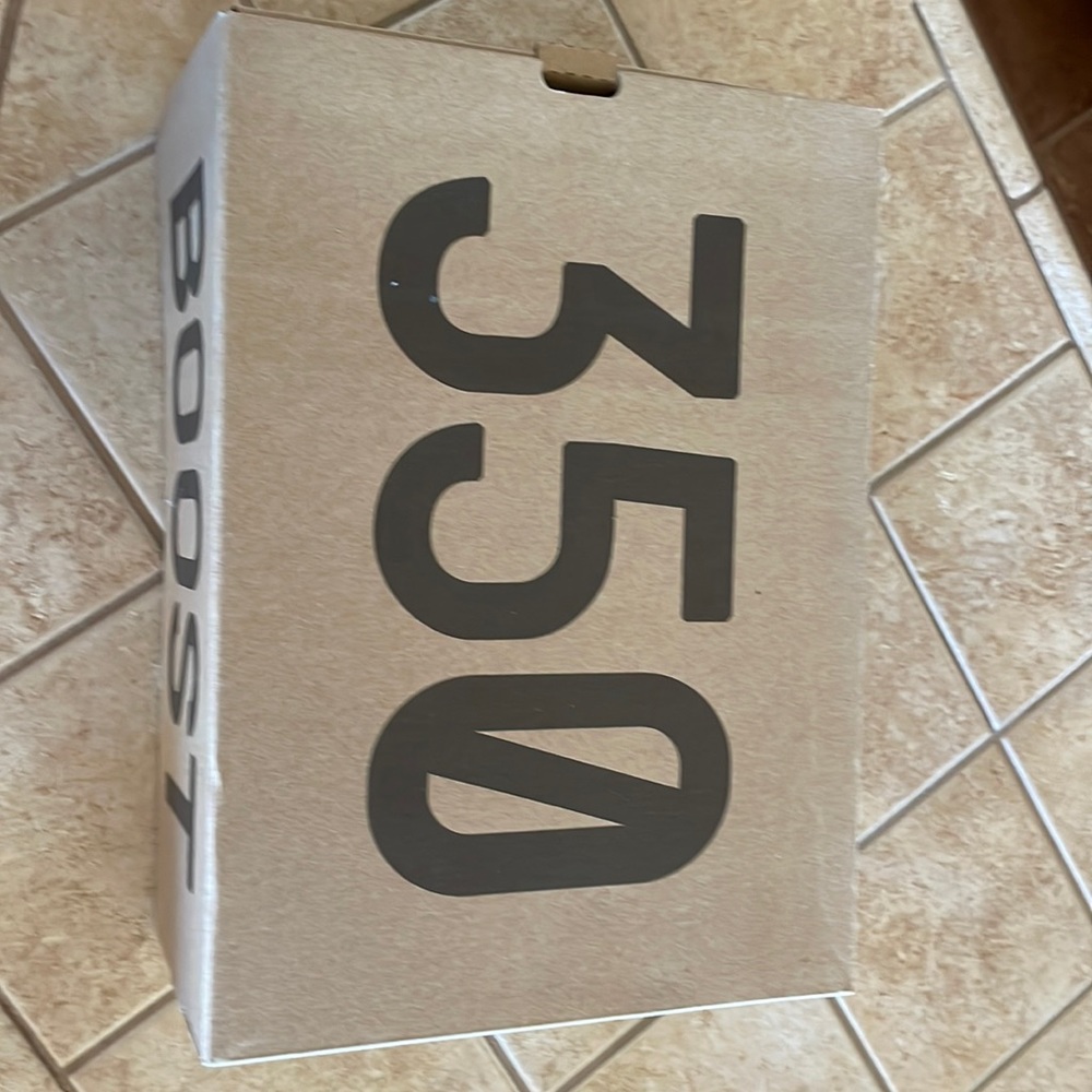 size 9 triple white v2’s